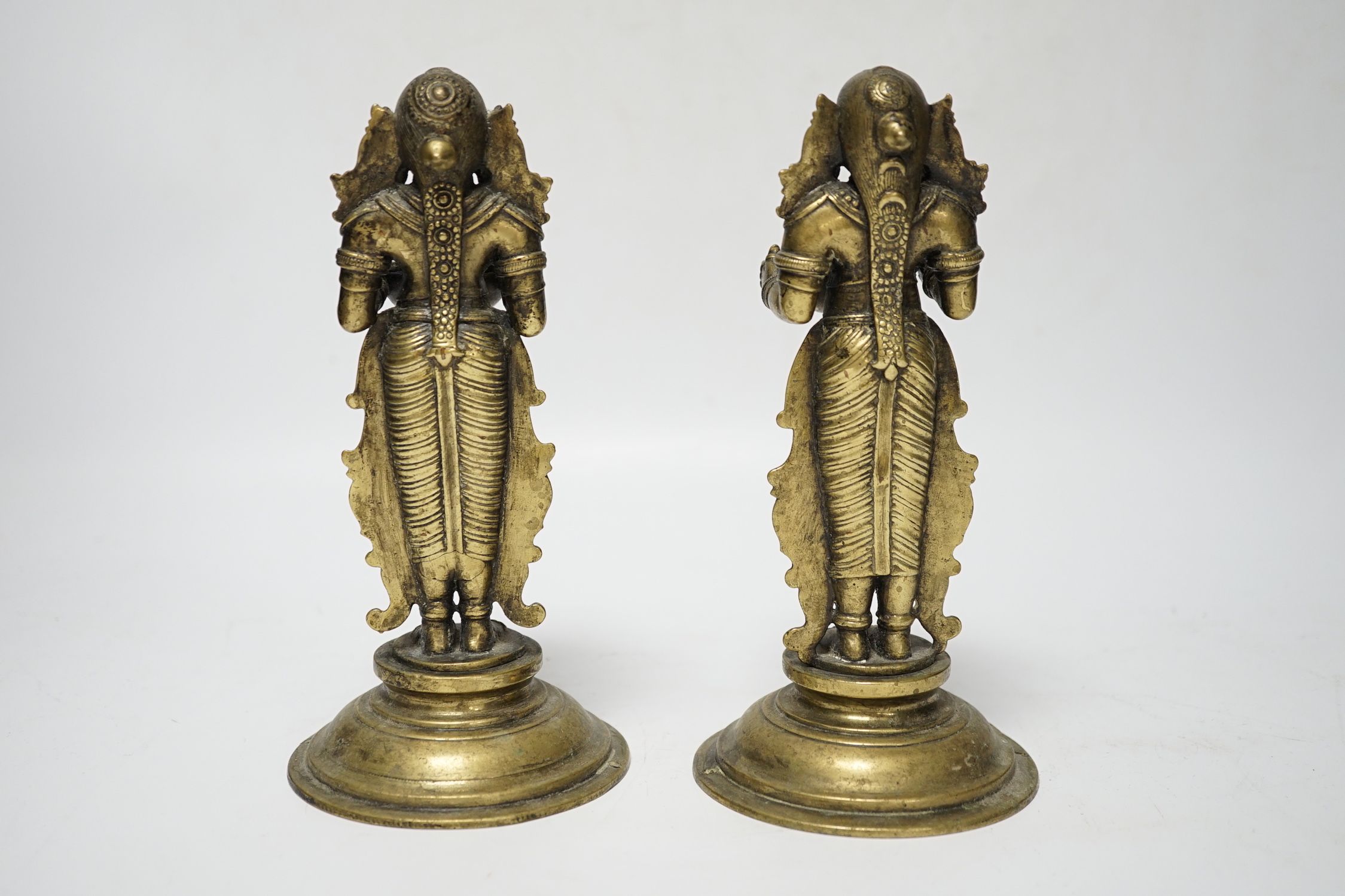A pair of 19th century Indian ‘Deepalakshni’ butter oil lamps, 19cm high
